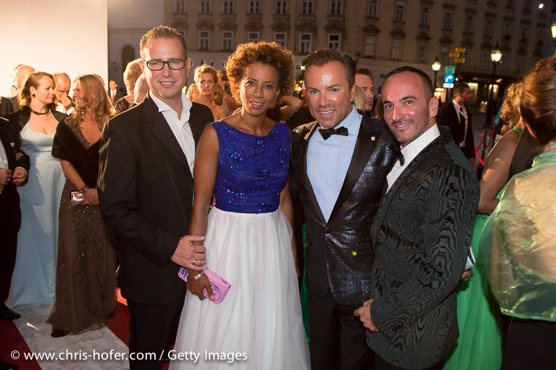VIENNA, AUSTRIA - JUNE 26: Arabella Kiesbauer with her husband Florens Eblinger and Uwe Kroeger with Christopher Wolf attend the Fete Imperiale 2015 on June 26, 2015 in Vienna, Austria.  (Photo by Chris Hofer/Getty Images)