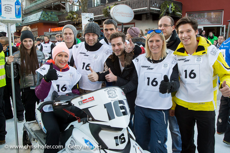 SAALBACH-HINTERGLEMM, AUSTRIA - DECEMBER 05:   The Team with Heather Mills (sitting), Stefan Koubek, Andrea Fischbacher, Antonio Liuzzi, Florian Straschil and Philip Eng during the third and final day of the Formula Snow 2015 ski opening on December 5, 2015 in Saalbach-Hinterglemm, Austria.  (Photo by Chris Hofer/Getty Images)