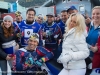 SAALBACH-HINTERGLEMM, AUSTRIA - DECEMBER 05:   Pamela Anderson poses with KINI Red Bull team members Kristian Ghedina, Kris Rosenberger, Simo Kirssi, Ben Hemingway, Timo Scheider, Andy Meklau and Heinz Kinigadner during the third and final day of the Formula Snow 2015 ski opening on December 5, 2015 in Saalbach-Hinterglemm, Austria.  (Photo by Chris Hofer/Getty Images)