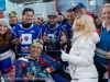 SAALBACH-HINTERGLEMM, AUSTRIA - DECEMBER 05:   Pamela Anderson poses with KINI Red Bull team members Kristian Ghedina, Kris Rosenberger, Simo Kirssi, Ben Hemingway, Timo Scheider, Andy Meklau and Heinz Kinigadner during the third and final day of the Formula Snow 2015 ski opening on December 5, 2015 in Saalbach-Hinterglemm, Austria.  (Photo by Chris Hofer/Getty Images)